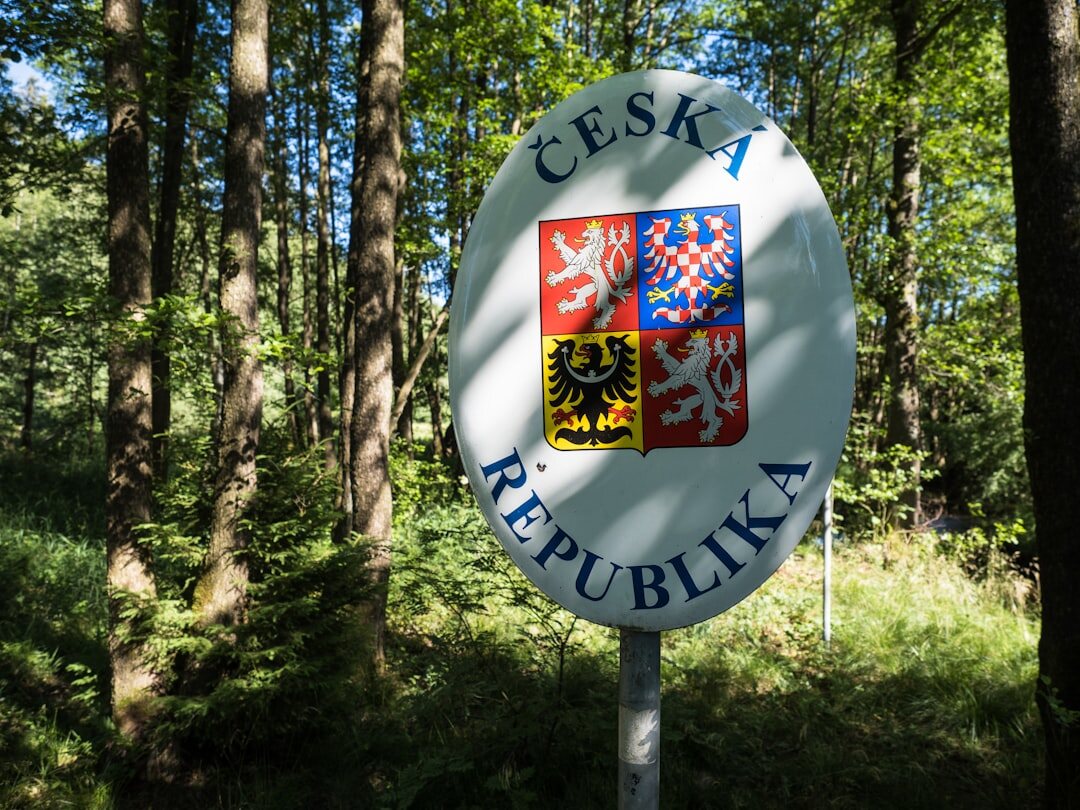 Wide view of a well tended Czech countryside garden in summer